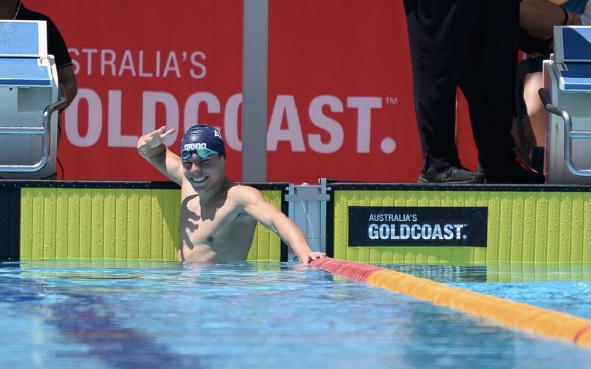 Dan smiling at the pool wall