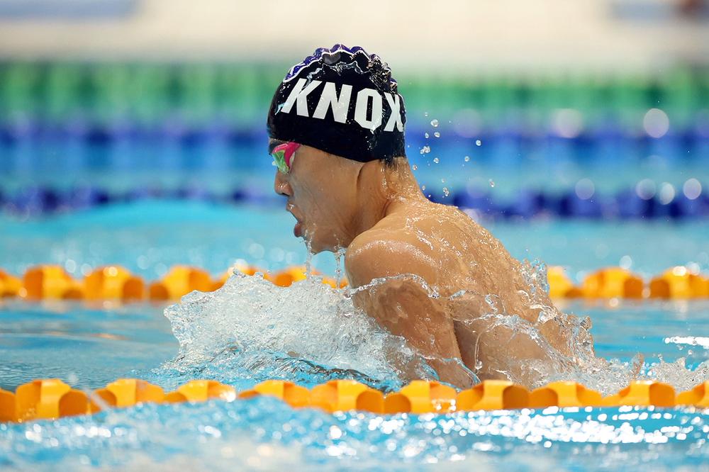 Evan breaststroke in a race lane